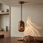 Scandinavian Wood Grain Mini Capsule Pendant Light with Spiral Motif Cutout - Image 2