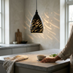 Modern Matte Black Teardrop Pendant Light with Spiral Wave Slit Cutouts - Image 2